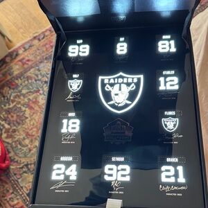 Raiders Collectors Tickets and box with light up wall plaque.